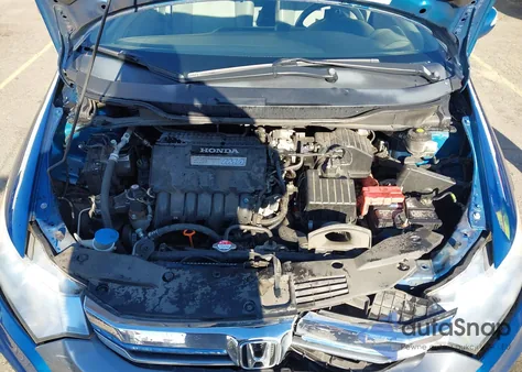 2013 Honda Insight Ex z USA, uszkodzony, nr VIN JHMZE2H74DS003501